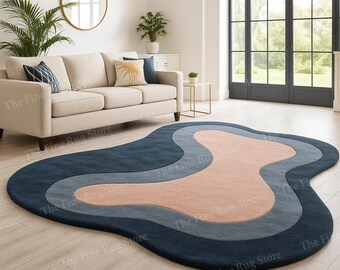Alfombra moderna con forma de onda tejida a mano / Alfombra de lana de lujo abstracta en azul marino, gris y rosa palo, decoración contemporánea para sala de estar o dormitorio.