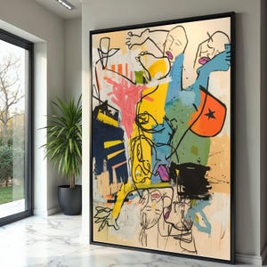 May include: Abstract art painting with a black frame. The artwork features a mix of colors including yellow, blue, pink, and black. The painting has a variety of shapes and lines, with some areas appearing to be brushstrokes and others more defined.