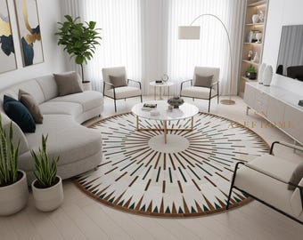 May include: A modern living room with a light gray curved sofa, two armchairs, and a round coffee table. A large, circular rug with a geometric pattern in brown, green, and white dominates the floor. Tall potted plants and artwork complete the space.