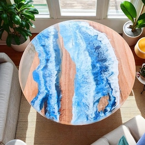 Blauwe golf epoxyhars salontafel: natuurlijk acaciahout met levende rand