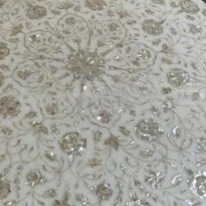 White round marble inlay table with floral design