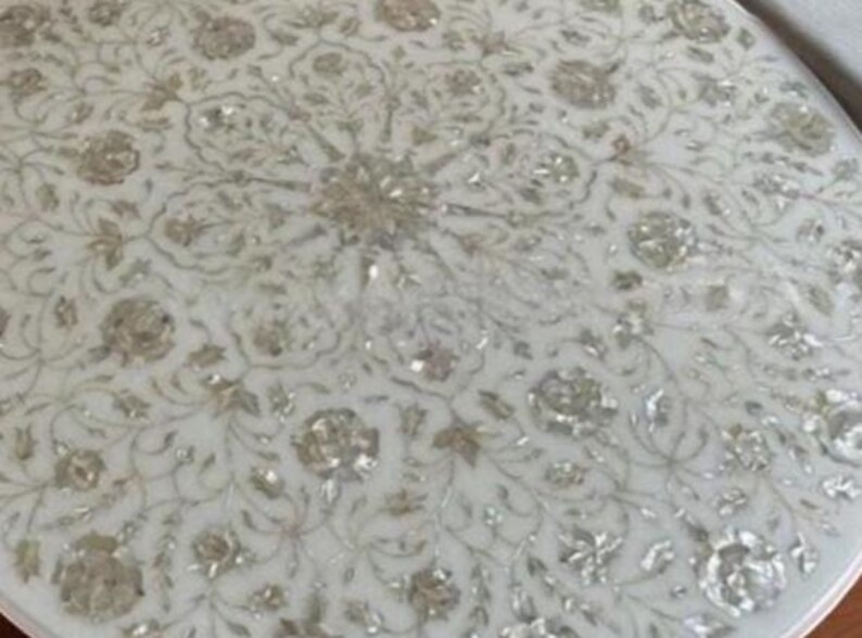 White round marble inlay table with floral design
