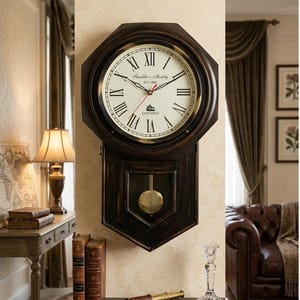 May include: A dark brown wooden wall clock with an octagonal frame and a pendulum housing. The clock face is off-white with black Roman numerals and the text Franklin & Murphy EST 1885 OXFORD. It features black hour and minute hands and a red second hand.