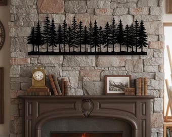 May include: Black metal wall art depicting a forest of pine trees. The silhouette of the trees is mounted on a stone wall above a fireplace. A clock, books, and framed art are on the mantel.
