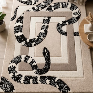 Tapis capitonné serpent fait main, tapis serpent géométrique beige noir et blanc