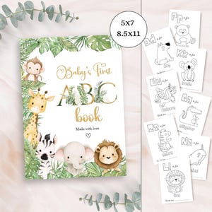 Può includere: Un libro ABC per bambini con illustrazioni di animali della giungla, tra cui una scimmia, una giraffa, una zebra, un elefante e un leone. La copertina riporta la scritta "Baby's First ABC book" e "Made with love". Include pagine da colorare.