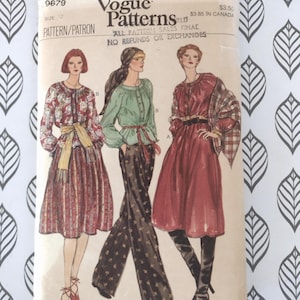 May include: Vintage Vogue Patterns envelope featuring illustrations of three women in dresses and pantsuits. The envelope has text that reads "Vogue Patterns" and "All Pattern Sales Final". The size is 12.