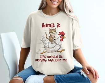 Camiseta de gato montando pollo, divertida camiseta de animal, top con gráfico de dibujos animados, diseño único, regalo humorístico, envío gratuito incluido.