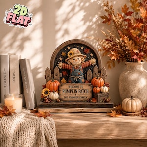 May include: A decorative tabletop sign featuring a scarecrow in a straw hat and overalls standing behind a wooden fence. The sign displays the text WELCOME TO PUMPKIN PATCH THE JOHNSON FAMILY, surrounded by orange pumpkins, sunflowers, and autumn leaves.