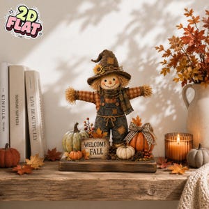 May include: A scarecrow figurine wearing a brown hat and plaid shirt with overalls, standing on a wooden base with pumpkins and a sign that reads WELCOME FALL. The display includes autumn leaves, a candle, and books in the background.