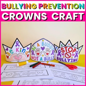 May include: Image of three paper crowns with anti-bullying messages. The crowns are white with black outlines and feature the phrases "Be Kind," "Be a Buddy Not a Bully," and "Stop Bullying." Coloring supplies and printed templates are also visible.