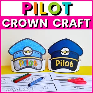 May include: Two pilot crown crafts, one light blue and one dark blue, with the word "Pilot" on the front. The image includes crayons, scissors, and a worksheet with the word "Pilot" and space for a name.