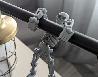 Juguete rompecabezas de esqueleto articulado: decoración y juego espeluznantes de Halloween