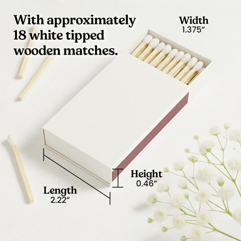 a box of matches with a total of 18 white tipped wooden matches inside, along with some additional matches and a flower arrangement.