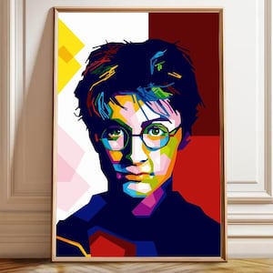 May include: A framed pop art portrait of a person with glasses. The artwork features a vibrant color palette of blue, green, yellow, red, and purple. The subject has dark hair and is wearing round glasses. The background is a mix of colors.