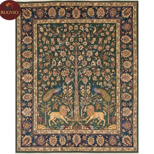 May include: A rectangular, green area rug with a central tree design, peacocks, and lions. The rug has a detailed border with floral patterns in shades of blue, gold, and cream. The rug is a decorative floor covering.