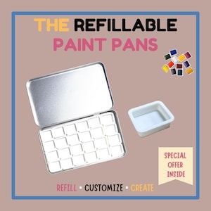 Pode incluir: Um conjunto de paletas de tinta de metal prateado com 24 poços vazios, uma bandeja de tinta branca separada e uma coleção de amostras de tinta coloridas. O texto diz "THE REFILLABLE PAINT PANS" e "REFILL • CUSTOMIZE • CREATE". Há também uma faixa "SPECIAL OFFER INSIDE".