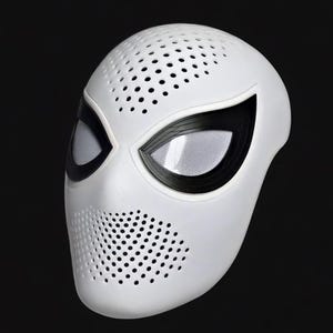 May include: A white superhero mask with black detailing around the eyes and mouth. The mask features small ventilation holes and mesh eye coverings. The design is reminiscent of a spider.