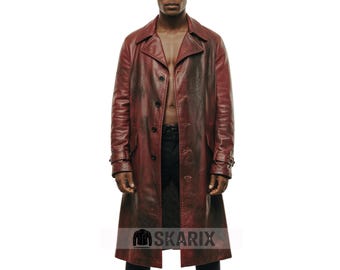 May include: A long, burgundy leather coat with a button-up front, lapel collar, and side pockets. The coat has a distressed appearance and is knee-length. The brand name, SKARIX, is printed at the bottom of the coat.