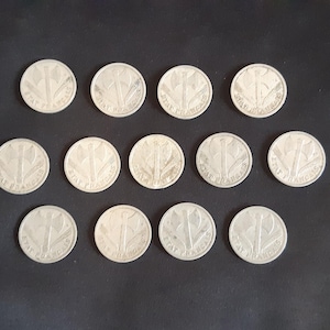 Set of 15 WWII 1 Franc Coins - 4 from 1942, 7 from 1943, and 4 from 1944 (Sold as set)
