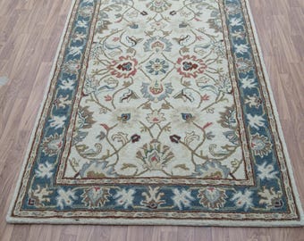 Hand-Tufted Wool Floral Rug: Traditional Oriental Style, Blue Border