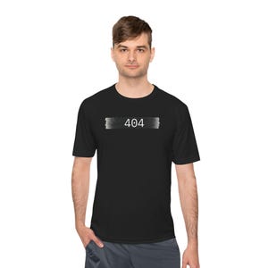 May include: Black t-shirt with the number "404" printed in white within a white rectangular shape. The shirt is short-sleeved and appears to be made of a moisture-wicking material.