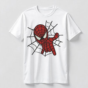 May include: White t-shirt featuring a red Spider-Man graphic. The design includes Spider-Man's head and hand, with a spiderweb background. The graphic is embroidered on the front of the shirt.