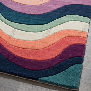 May include: A colorful area rug with a wave pattern. The rug features bands of color including purple, teal, green, orange, and blue. The rug is made of a soft, plush material and is suitable for a living room or bedroom.