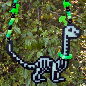 Glow in the dark dino skeleton perler necklace