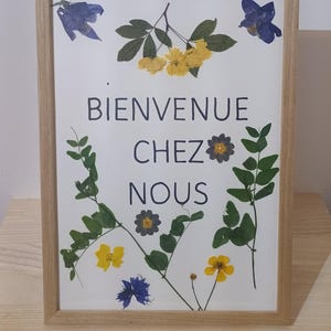 Cartel de bienvenida con flores secas