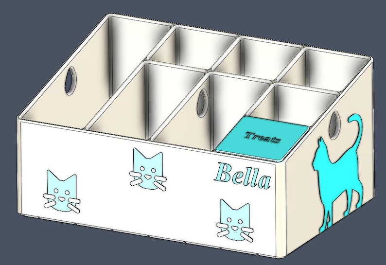 May include: A white rectangular storage organizer with six compartments of varying heights. The front and side feature light blue cat silhouettes and the name Bella. One compartment has a light blue lid with the word Treats printed on it.