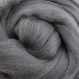 May include: A close-up of a bundle of charcoal gray wool roving. The wool is soft and fluffy, perfect for felting or spinning.
