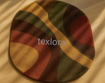 May include: A round rug with a retro design. The rug features a pattern of curved stripes in shades of brown, orange, yellow, and green. The word "texlora" is printed on the rug. The rug is placed on a wooden floor.