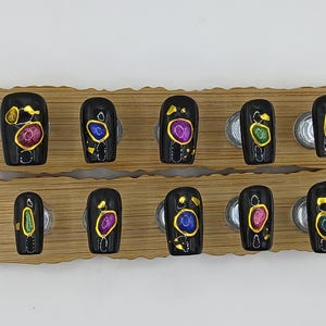 Black glossy geodes press-on nails.
