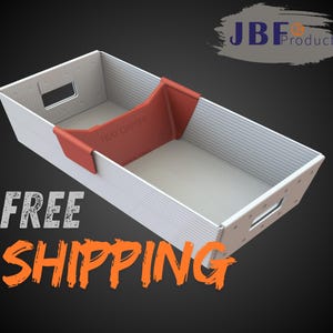 May include: A white and red tray with the text "TRAY DAPPER" and "JBF Products". The tray has a corrugated design and cut-out handles. The words "FREE SHIPPING" are also visible.