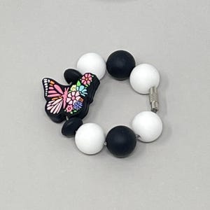 Dije de taza de vaso con forma de mariposa