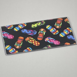 Checkbook Cover Flip Flops on Black