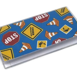Chequeboekomslag in aanbouw
