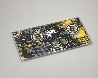 Cubierta de chequera de hockey de los Boston Bruins