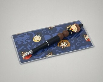 Funda para chequera y juego de bolígrafo con cuentas de Harry Potter y sus amigos