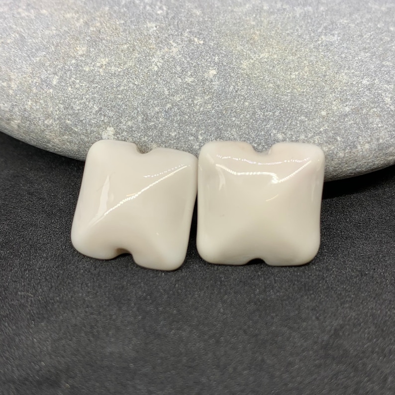Handmade lampwork bead pair soft ivory square pillows