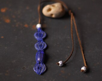 knitted necklace OURZA in indigo blue