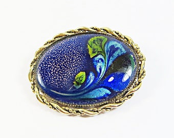 Broche de esmalte vintage, tono dorado con esmalte azul, firmado por la artista Janna Hodgson, encantador broche de esmalte azul vintage de la década de 1990