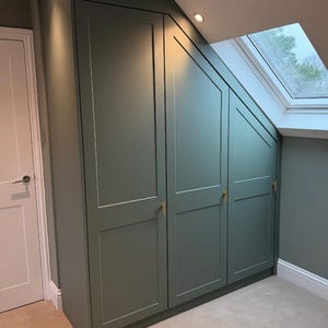 Bespoke fitted wardrobes with paint finish