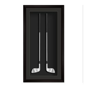 May include: Two golf clubs displayed in a black shadow box frame. The clubs have silver heads and shafts with black grips, set against a black background. The frame is rectangular and has a dark border.