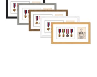 May include: Multiple rectangular picture frames in black, gray, brown, white, and light wood tones. Each frame displays a medal with a ribbon. The light wood frame has a 4x6 inch photo space.