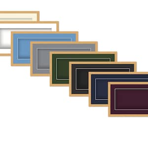 May include: A collection of rectangular picture frames in various colors, including cream, white, light blue, gray, dark green, black, navy, and burgundy. Each frame has a light brown wooden border and a white inner border.
