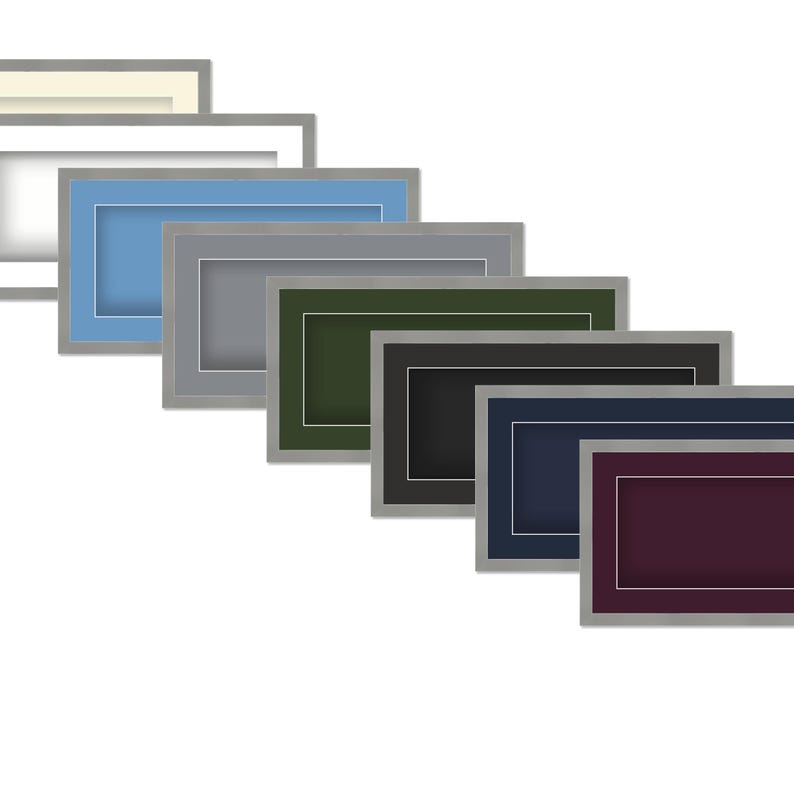 May include: A collection of rectangular picture frames in various colors, including blue, gray, green, black, navy, and burgundy. Each frame has a silver border and a white inner mat, creating a layered effect. The frames are arranged diagonally.