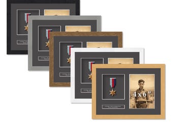 May include: A collection of framed military medals and photographs in various frame colors, including black, gray, brown, white, and light wood. The frames are designed to hold a 4x6 inch photo and a medal.