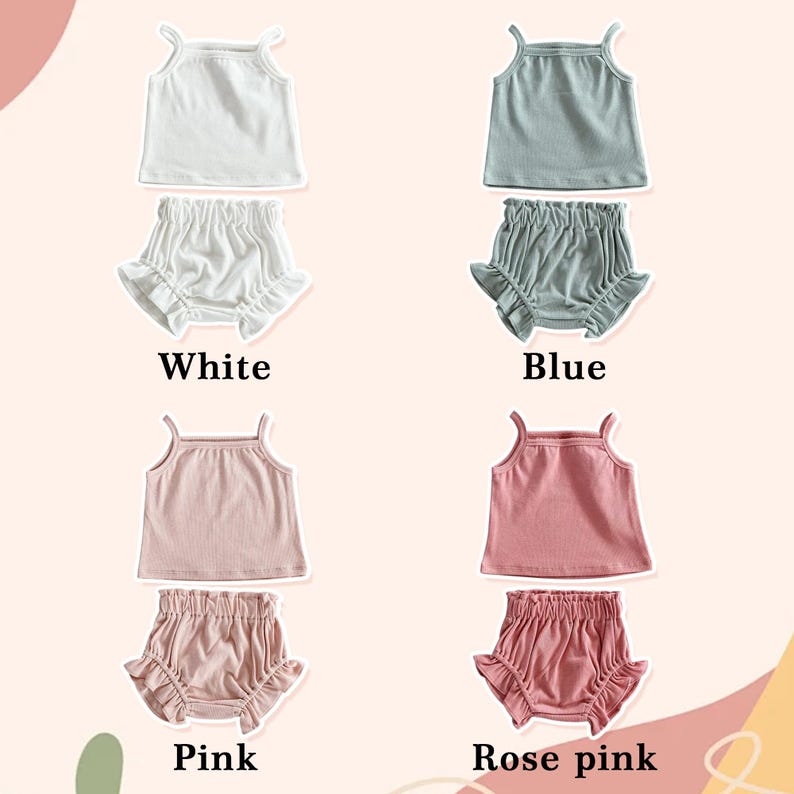 May include: Four sets of baby clothing in white, blue, pink, and rose pink. Each set includes a vest top and ruffled shorts. The text "White", "Blue", "Pink", and "Rose pink" is displayed below each set.
